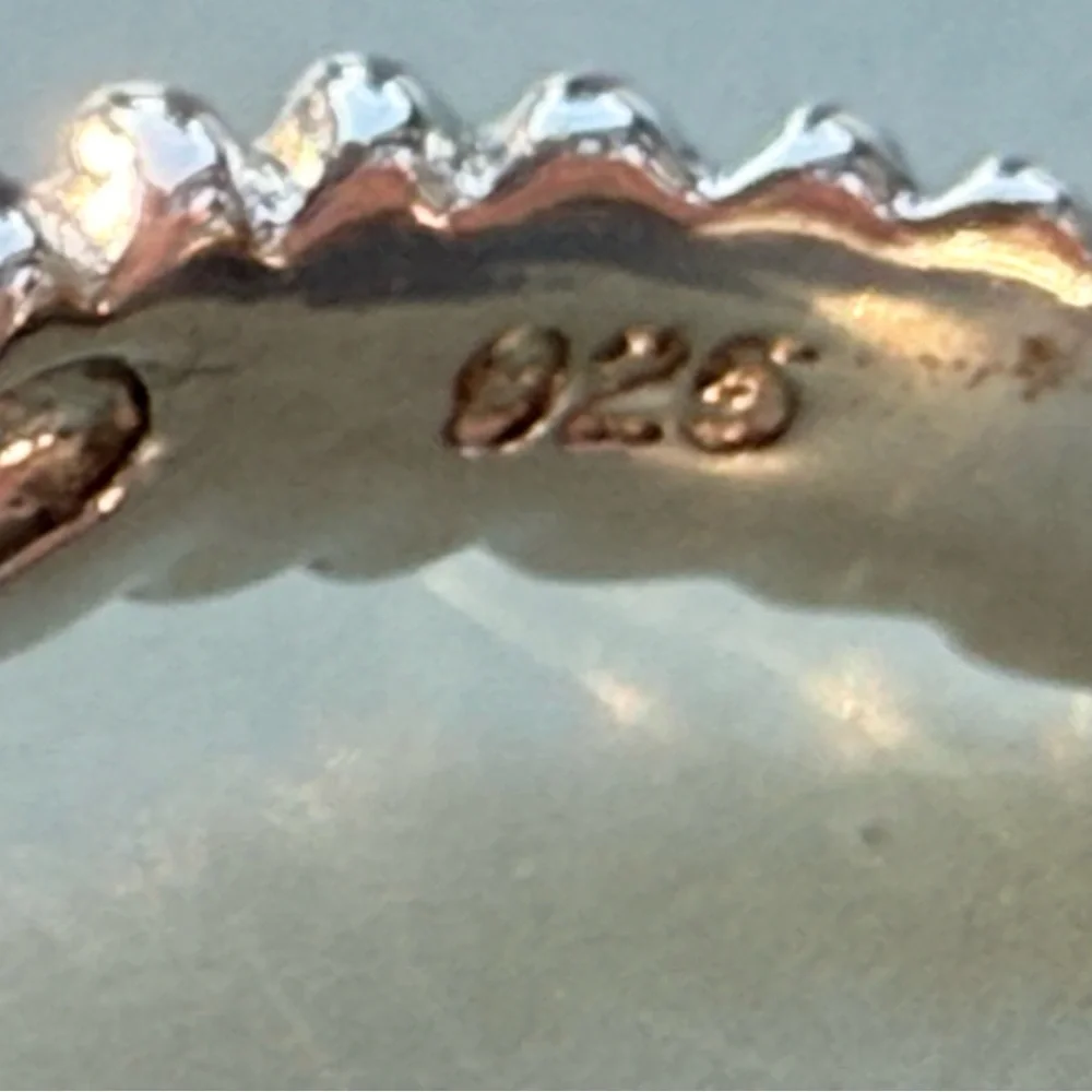 Genuine silver and seven-stone tanzanite ring, size 6 3/4